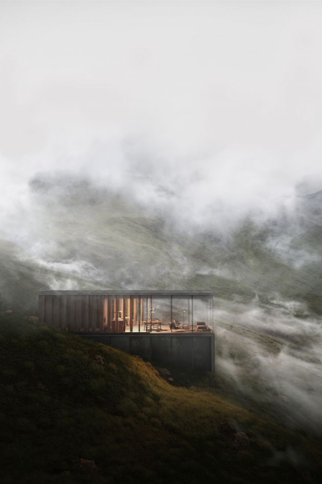 a house on top of a hill surrounded by fog