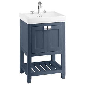 a bathroom vanity with a white sink and blue stand up cabinet on the left side