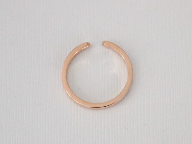 14K rose gold slightly tapered half eternity cuff ring set with round brilliant cut diamonds weighing 0.12 ct (G/VS2,SI1). 2.1 mm band, available in all sizes. Also available in 14K white or yellow gold, 18K (any color), platinum and palladium. Please send us an email for these options. *Made to order *SKU 16-101473 Rose Gold Stackable Open Band Rings, Modern Rose Gold Midi Ring With Open Band, Stackable Rose Gold Open Band Midi Rings, Stackable Rose Gold Midi Rings With Open Band, Rose Gold Stackable Midi Rings With Open Band, Rose Gold Open Band Diamond Ring, Diamond Cuff Ring, Cuff Ring, Full Eternity Ring