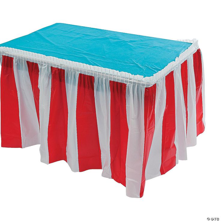 a red and white striped table cover with blue top