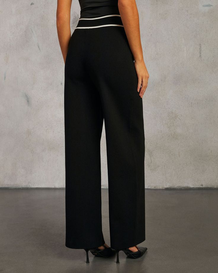 Step into sophistication with the Keeting Contrast High Waisted Pants—a wardrobe essential for the discerning fashionista. Crafted from heavyweight knit fabric, these pants feature a chic contrast waist that adds a touch of upscale elegance. Perfect for achieving a polished look with effortless ease, these pants embody a rich girl aesthetic with their traditional, yet modern, appeal. Pair with the matching cardigan, sold separately, to complete the look. Runs large, consider sizing down Heavywei Rich Girl Aesthetic, Rich Girl, Polished Look, High Waisted Pants, Wardrobe Essentials, Side Zipper, Black Pants, Knit Fabric, High Waisted