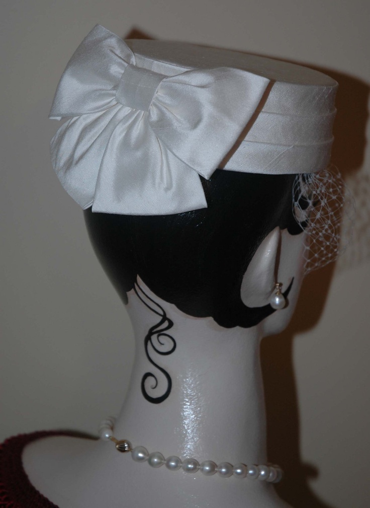 Ivory Bridal Wedding Pillbox Hat with Veil. $225.00, via Etsy. Elegant Evening Hat With Satin Bow, Classic White Bridal Accessories For Formal Occasion, Elegant White Adjustable Top Hat, Elegant White Hat For Gift, Elegant Adjustable Fascinator As A Gift, Elegant Pinched Crown Top Hat For Formal Events, Elegant Top Hat With Pinched Crown For Formal Events, Elegant Wedding Hats With Satin Bow, Elegant Top Hat With Pinched Crown For Formal Occasions