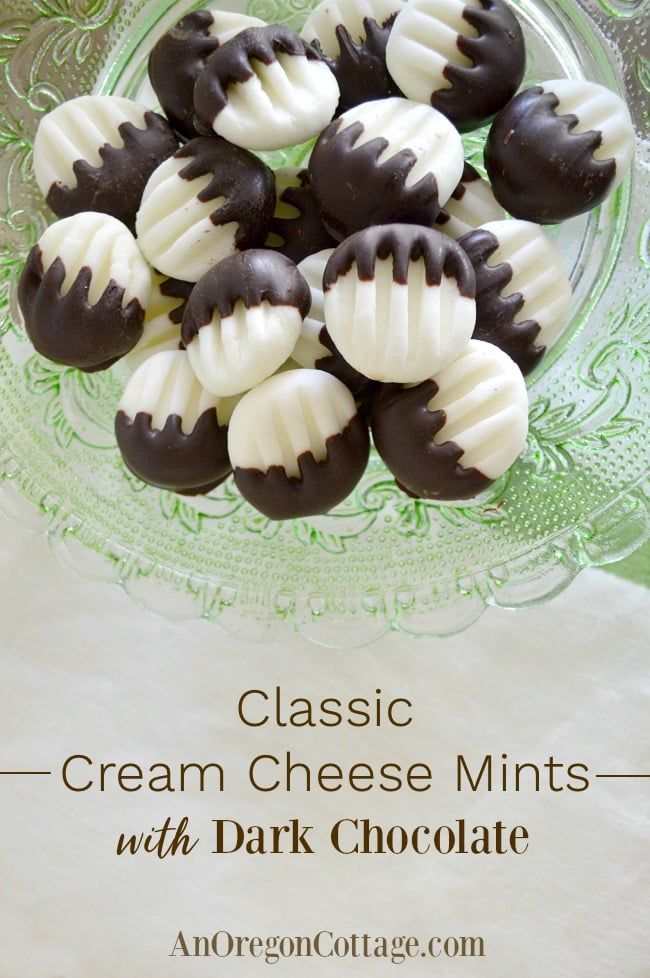 cream cheese mints with dark chocolate on a glass plate