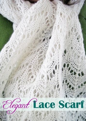 a close up of a scarf on top of a green cloth with the words elegant lace scarf written below it