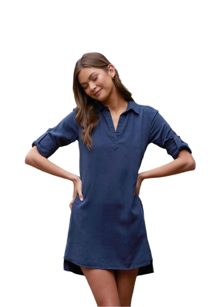 The Long Sleeve A-Line Dress is a comfortable dress in a soft-touch fabric that gives it a luxurious look. Designed with side pockets for practicality and a round hem. Made with 100% TENCEL™ Lyocell. Color, Endless Sea (deep, rich navy) Casual Relaxed Fit Tunic For Workwear, Casual Short Sleeve Tunic For Work, Casual Short Sleeve Workwear Tunic, Casual Dresses With Roll-up Sleeves For Work, Casual Shirt Dress With Shirttail Hem For Work, Relaxed Fit Shirt Dress With Rolled Sleeves, Casual Short Sleeve Tunic With Pockets, Casual Tunic With Pockets And Short Sleeves, Casual Workwear Dress With Shirttail Hem