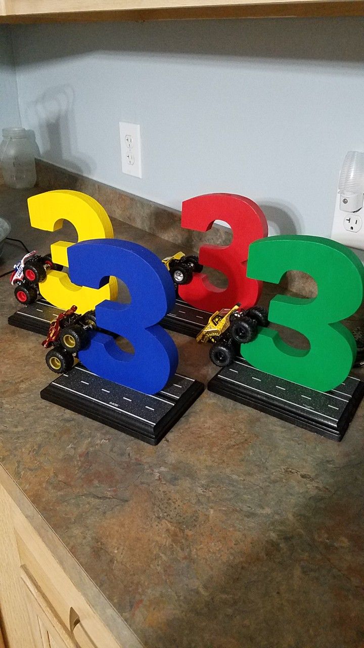 the numbers are made out of legos on top of a countertop in a kitchen