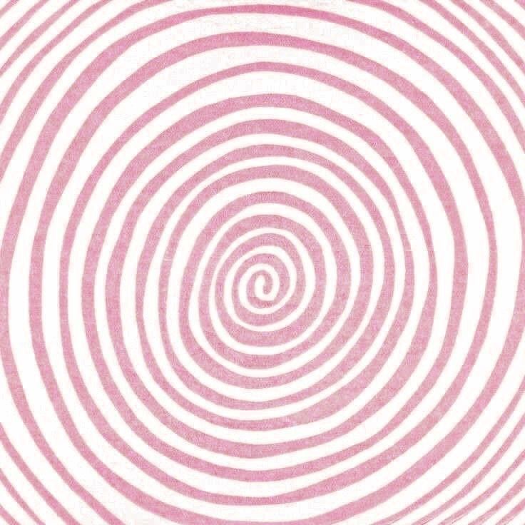 an image of a pink and white background with spirals in the shape of circles