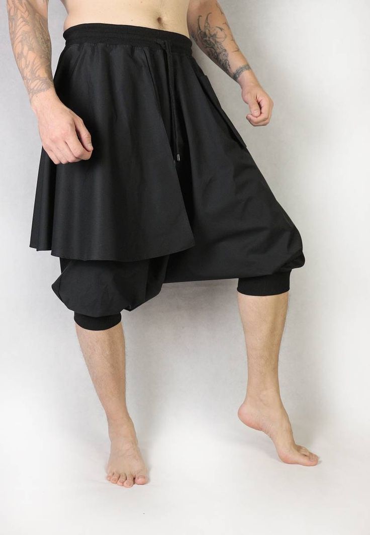 Made from Italian cotton Cotton 88% elastane 12% Fitted Techwear Bottoms For Spring, Cotton Wide Leg Harem Pants For Athleisure, Cotton Wide-leg Athleisure Harem Pants, Spring Cotton Techwear Bottoms, Oversized Black Harem Pants Casual Style, Oversized Black Casual Harem Pants, Cotton Techwear Harem Pants For Streetwear, Casual Black Cotton Harem Pants, Stretch Pants For Streetwear In Summer