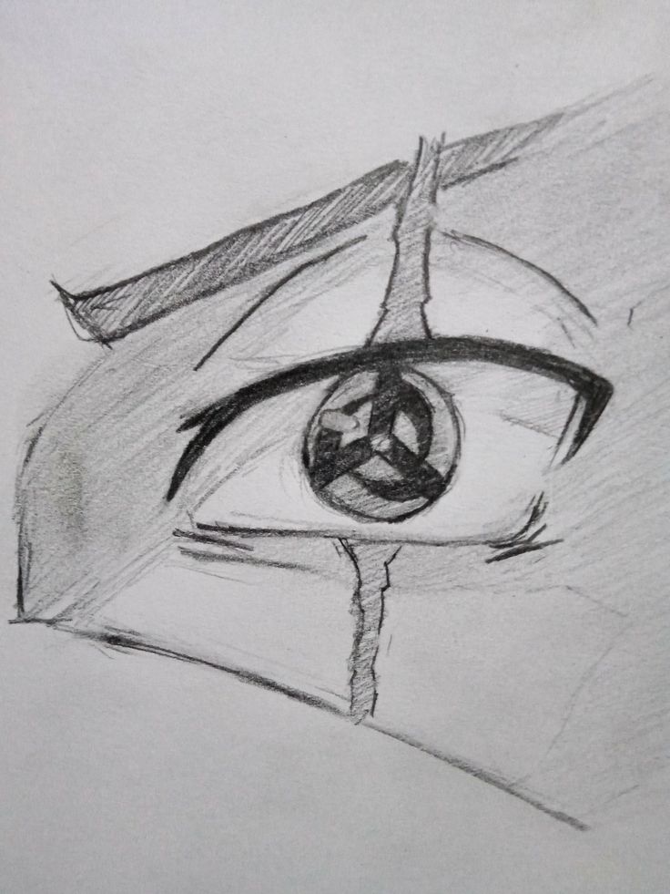 a pencil drawing of an eye with a cross on it