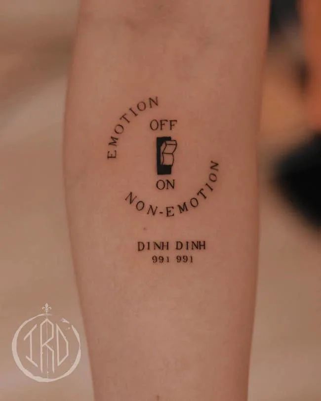 a close up of a person's arm with an inscription on it that says emotion off