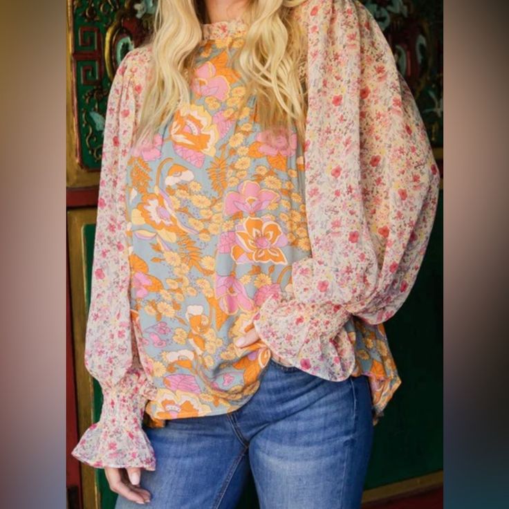 Floral Print Chiffon Top With A Frill Mock Neckline And Long Bubble Sleeves With Smocked Cuffs. - Unlined, Partially Sheer, Lightweight. Size Medium Nwt Smoke Free Home. Casual Floral Patchwork Blouse For Fall, Fall Pink Bishop Sleeve Blouse, Pink Bishop Sleeve Blouse For Fall, Multicolor Balloon Sleeve Blouse For Spring, Pink Bishop Sleeve Blouse For Spring, Fall Floral Print Peasant Top With Balloon Sleeves, Bohemian Ditsy Floral Print Tops For Fall, Spring Long Sleeve Blouse With Floral Patchwork, Multicolor Feminine Blouse With Ditsy Floral Print