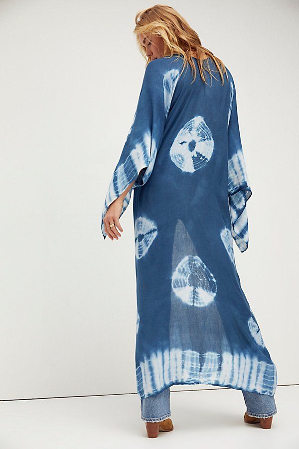 In a super soft fabric and tie dye pattern this oversized maxi kimono features statement cutout detailing under the arms. Flowy Long Cover-up For Vacation, Long Flowy Cover-up For Vacation, Blue Breezy Flowy Cover-up, Blue Flowy Breezy Cover-up, Flowy Unlined Cover-up For Vacation, Bohemian Lightweight Cover-up For Beach Party, Oversized Bohemian Cover-up For Loungewear, Bohemian Oversized Cover-up For Loungewear, Bohemian Rayon Cover-up For Vacation