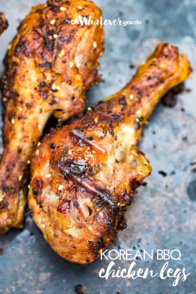 two pieces of cooked chicken sitting on top of a table