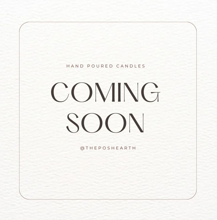 a white card with the words coming soon in black and white lettering on top of it