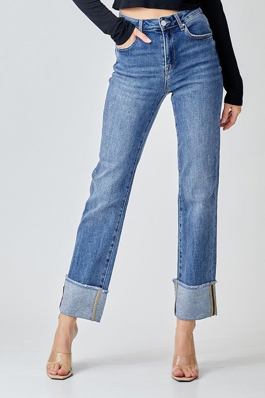 The high rise loose straight jeans by Risen feature a bit of stretch. The cuff hem is not sewn, so you can adjust it, or wear without the cuff at all. We recommend sizing down. Fabric Contents: 91% Cotton, 6% Polyester, 3% Spandex Jeans With Cuffs, Big Cuff Jeans Outfit, Cuffed Jeans Outfit, Risen Jeans, Cute Wardrobe, Loose Straight Jeans, Cuffed Denim Jeans, Cuffed Jeans, Relaxed Jeans