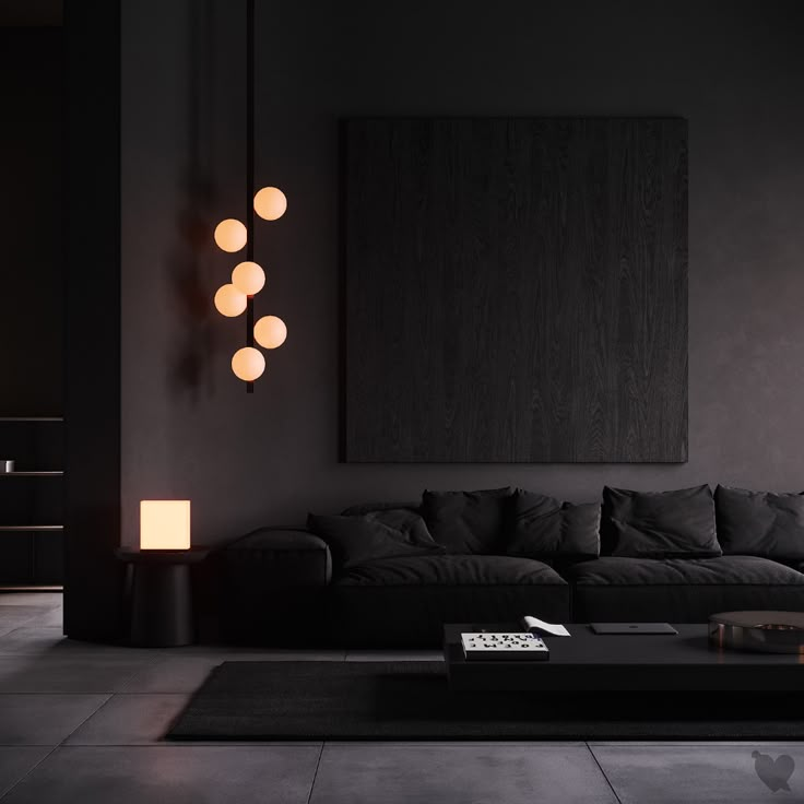 a living room with black furniture and lights