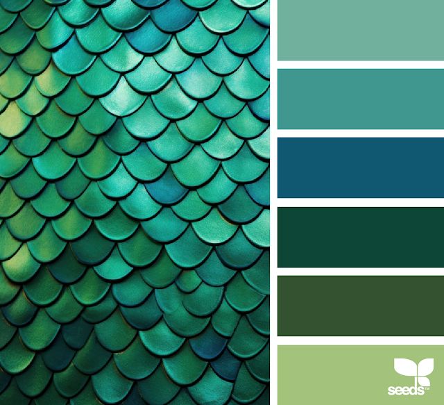 a green and blue color scheme with fish scales on the top, bottom, and bottom