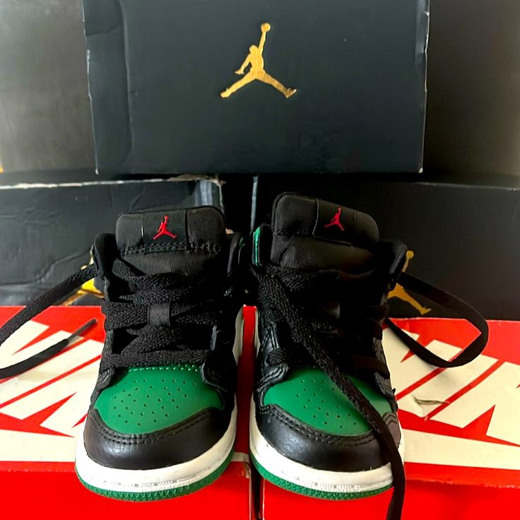 Black And Green Baby Jordans Size 4c New In The Box Green Sneakers With Rubber Sole For Playtime, Black Casual Sneakers With Soft Sole, Black Sporty Sneakers, Casual Black Jordan Shoes, Black High-top Sneakers With Soft Sole, Jordan Shoes Green, Black Sporty Sneakers For Playtime, Sporty Black Sneakers For Playtime, Casual Black Non-slip Jordan Shoes