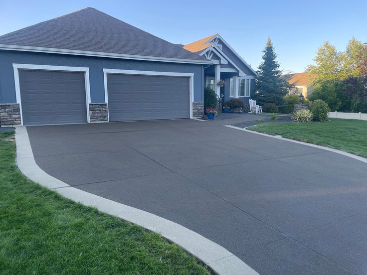 a large driveway in front of a house