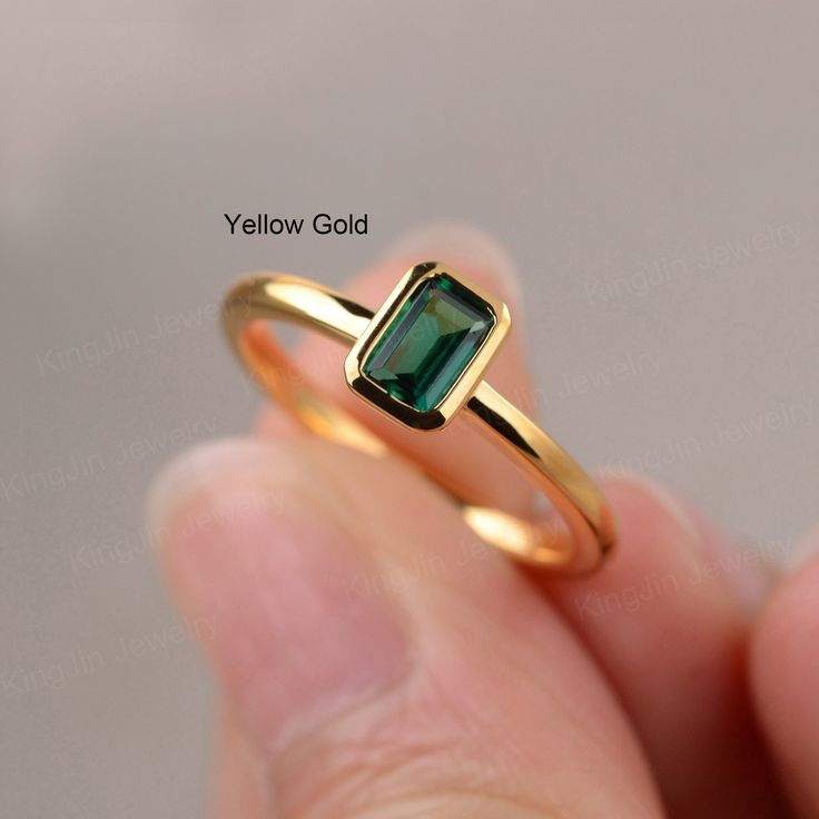 This is a gorgeous handmade creation. Its beauty is its simplicity & Elegance.  The 4*6mm emerald cut lab emerald is crafted in vermeil sterling silver. It is available to customized, if you have any mind, just let me know, we will discuss with it. All item is sent in a beautiful gift box You can realize more lovely stuff clicking the link https://www.etsy.com/shop/knightjewelry?refshopsection_shophome_leftnav Please leave the correct address and you PHONE NUMBER for delivering successfully. Gold Emerald Ring With Radiant Cut, Gold Radiant Cut Emerald Rings, Minimalist Emerald Cut Green Jewelry, Minimalist Emerald Cut Birthstone Ring With Bezel Setting, Stackable Emerald Cut Emerald Ring, Minimalist 14k Gold Emerald-cut Birthstone Ring, Stackable Emerald Cut Emerald Birthstone Ring, Minimalist Gold Emerald Birthstone Ring, Minimalist 14k Gold Emerald Cut Birthstone Ring