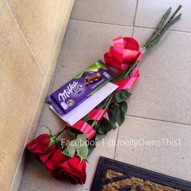 roses and chocolate bars are on the floor