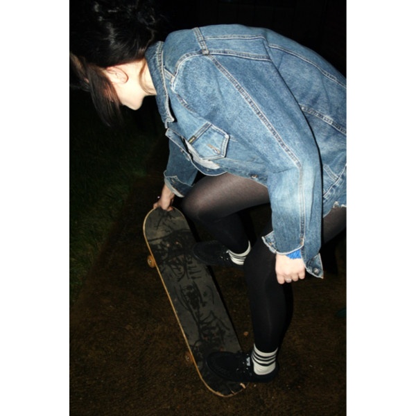 a person on a skateboard in the dark