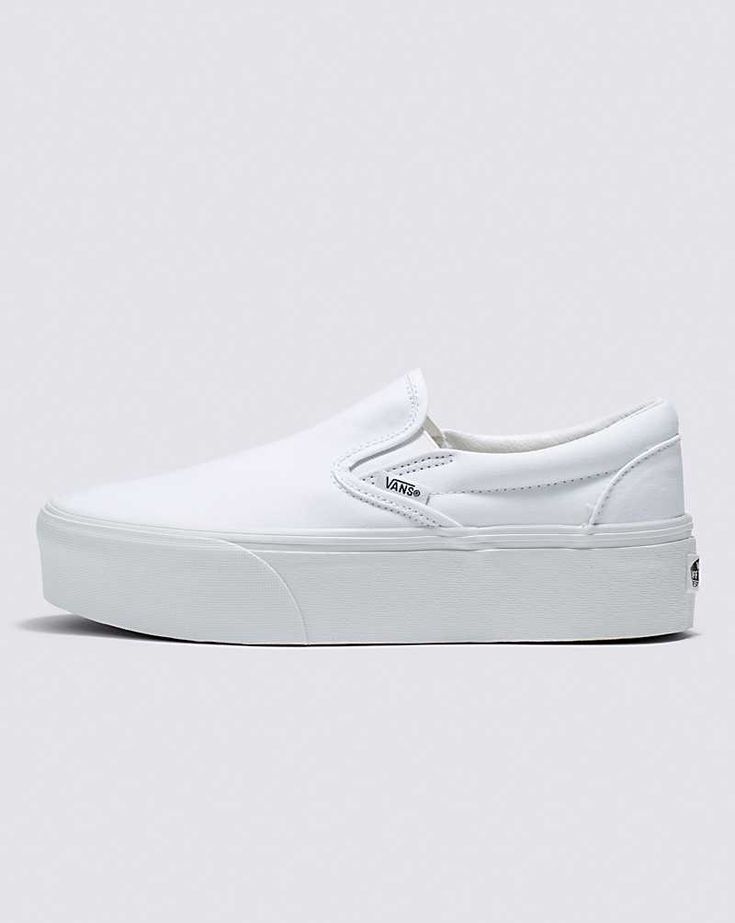 Classic Slip-On Stackform Shoe Thick Bottom Slip-on Platform Sneakers For Streetwear, White Slip-on Platform Sneakers With Thick Bottom, White Slip-on Sneakers With Platform And Round Toe, White Platform Slip-on Sneakers With Round Toe, White Slip-on Sneakers With Platform, White Low-top Platform Slip-on Sneakers, Vans White Slip-on Sneakers With Rubber Sole, Vans Platform Sneakers For Summer, Vans Slip-ons With White Sole And Round Toe