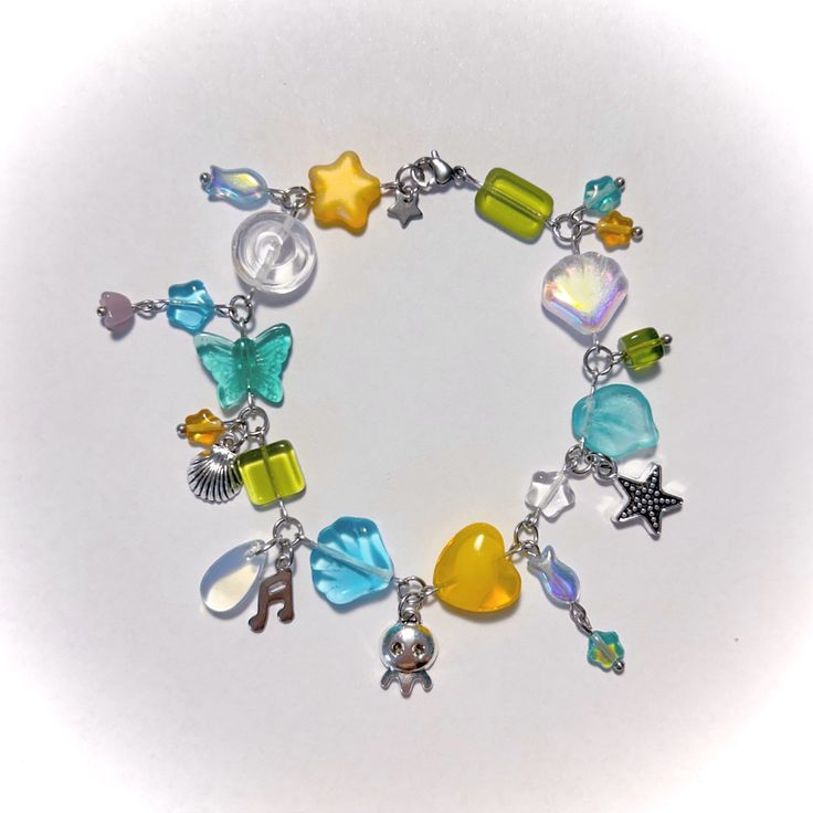 a close up of a bracelet with charms