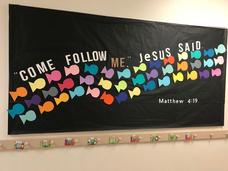 a bulletin board with the words come follow me, jesus said and hearts on it