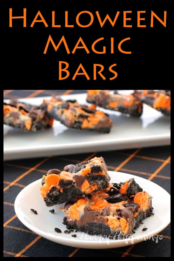 halloween magic bars on a white plate