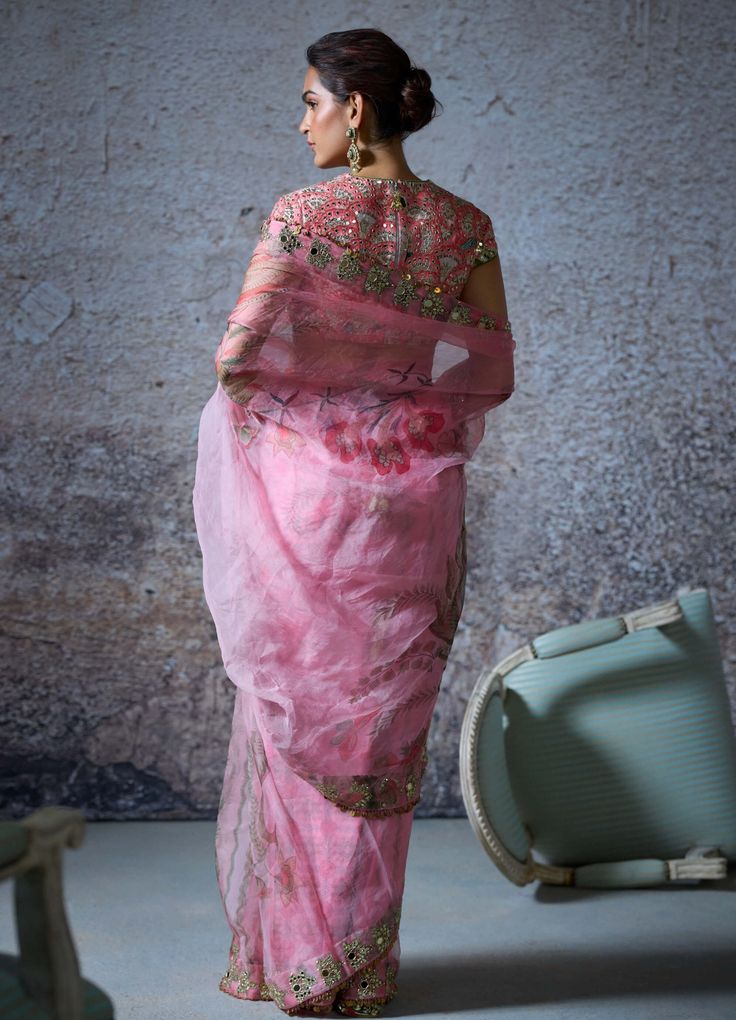 This blush pink ensemble features a pre-draped embroidered sari paired with an intricately embroidered blouse. Crafted from luxurious raw silk and organza, this set combines rich textures and elegant detailing for a sophisticated and graceful appearance. Mahima Mahajan, Drape Saree, Embroidered Saree, Embroidered Organza, Western Wedding, Organza Saree, Wedding Service, Pink Saree, Printed Sarees