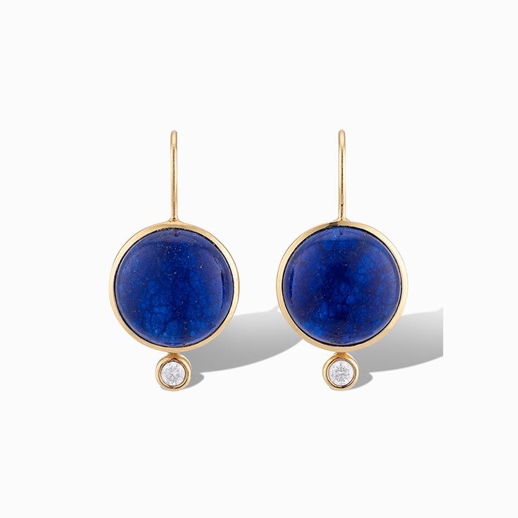 Inspired by our statement Dropping Circles earrings, we designed the Tiny Mini Drops to be worn with all your everyday looks. Each semi-precious gemstone sits next to a small cubic zirconia cabouchon for a subtle pop of sparkle. Add them to any outfit for colorful fun! Details Lightweight drop earrings Made of genuine blue quartz and cubic zirconia stone Set in 14k gold plated brass Dimensions: 5/8" Wide x 1 1/8" Long Modern Blue Earrings With Gemstone Accents, Modern Sterling Silver Earrings With Cabochon, Classic Round Earrings With Gemstone Accents, Modern Cabochon Earrings For Gifts, Modern Cabochon Earrings Gift, Modern Diamond Earrings With Bezel Setting, Fine Jewelry Drop Earrings With Cabochon, Fine Jewelry Cabochon Drop Earrings, Sapphire Earrings With Gemstone Accents