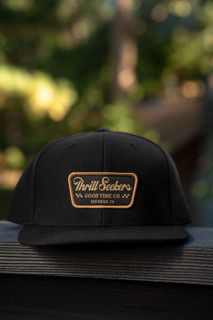 Thrill Seekers - A Good Time Company. This clean lid features our 'Billboard' patch sewn into a black 6 panel snapback hat. Features High profile, mid-deep fitting structured snapback Plastic adjustable snapback Flat Bill One Size Fits All Materials 100% Cotton Canvas Fitted Flat Bill Snapback Hat For Outdoor, Black Fitted Trucker Snapback Hat, Fitted Black Trucker Snapback Hat, Fitted Snapback Hat With Flat Brim For Outdoor, Fitted Flat Bill Baseball Cap For Outdoor, Fitted Flat Brim Snapback Hat For Outdoor, Outdoor Snapback Fitted Hat With Logo Patch, Outdoor Fitted Snapback Hat With Logo Patch, Fitted Snapback Hat With Logo Patch For Outdoor