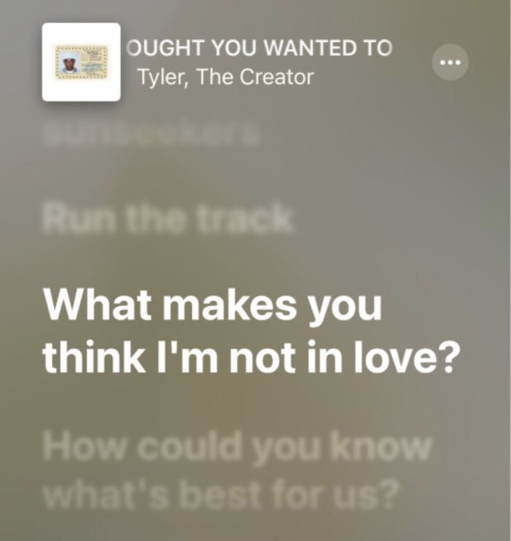 the text on the phone says, what makes you think i'm not in love?