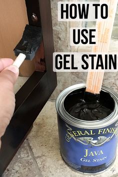 a hand holding a paint brush over a can of gel stain with the words how to use it