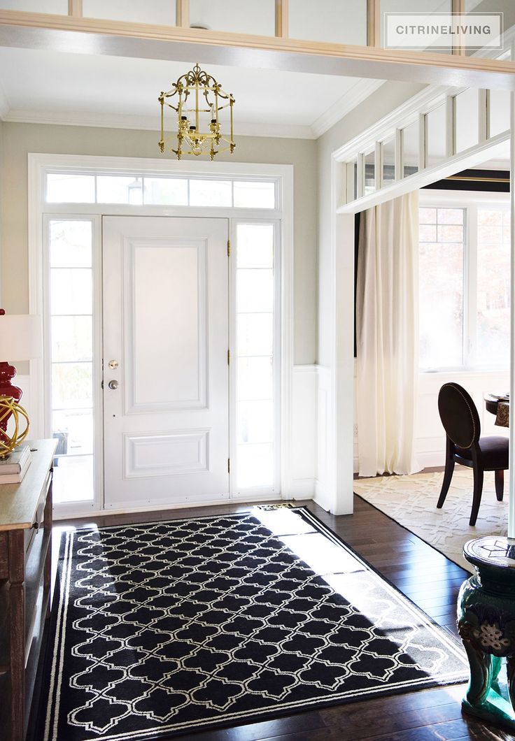 an instagram photo of a living room and entryway