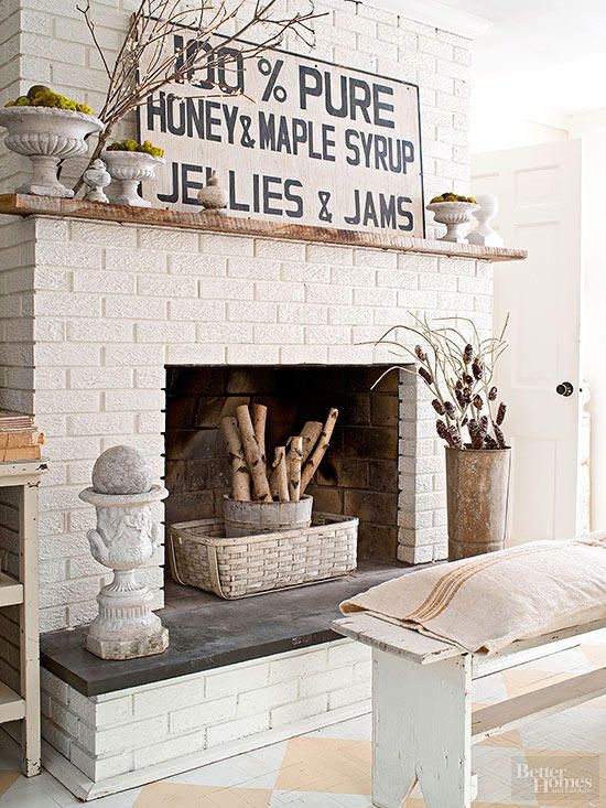 a white brick fireplace in a living room