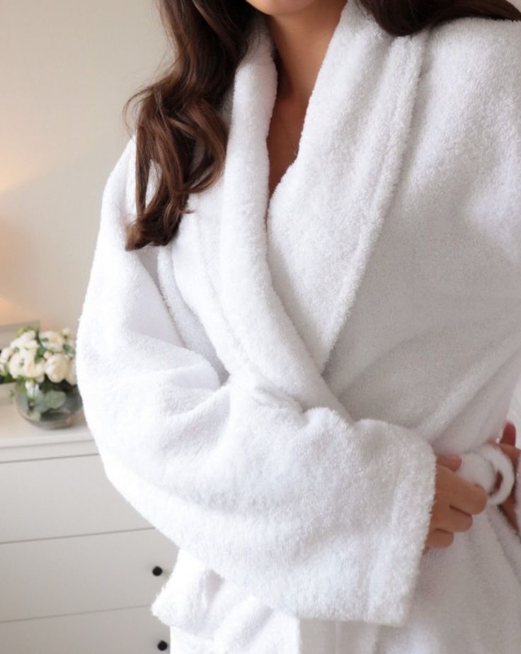 Retreat for a relaxing evening at home in our signature Mirage Robe. Expertly woven along the Aegean coast with 450gsm 100% Turkish cotton which is breathable, absorbent and lightweight, giving you the perfect blend of comfort and quality. ﻿Featuring a shawl collar and below the knee length. White Bath Robes For Women, Womens Grey Robes, Cute Bathroom Robe, Hospital Robe Pictures, Luxury Silk Robe For Vacation, Women Bath Robe, Cute Spa Robes, Night Robe Fluffy, Luxury Cream Robe For Women