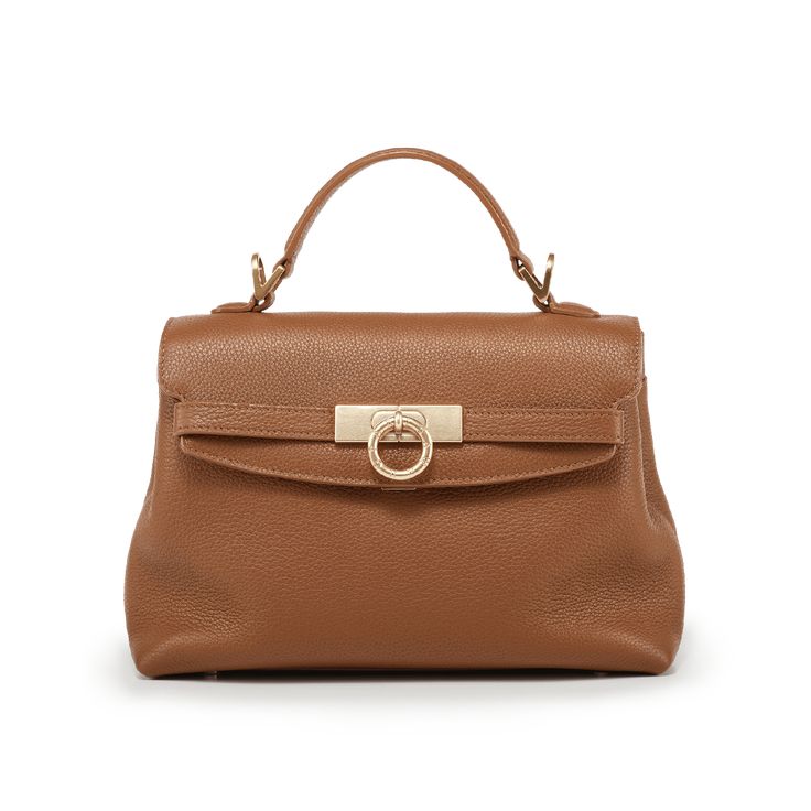 Inspired by Grace Kelly's enduring style, the Grace Soft Top Handle Bag is meticulously crafted from premium USA full-grain textured calfskin leather, ensuring both durability and elegance. Its timeless and versatile design features a thoughtfully structured interior that comfortably accommodates all your everyday essentials. Whether day or night, you'll find yourself instinctively reaching for this chic and easy-to-wear masterpiece. Timeless Pebbled Leather Tote Shoulder Bag, Timeless Pebbled Leather Top Handle Bag, Timeless Textured Leather Crossbody Satchel, Timeless Pebbled Leather Office Bag, Elegant Satchel In Textured Pebbled Leather, Elegant Top Handle Satchel In Pebbled Leather, Elegant Satchel With Textured Pebbled Leather, Elegant Bags With Detachable Strap In Pebbled Leather, Timeless Soft Leather Shoulder Bag