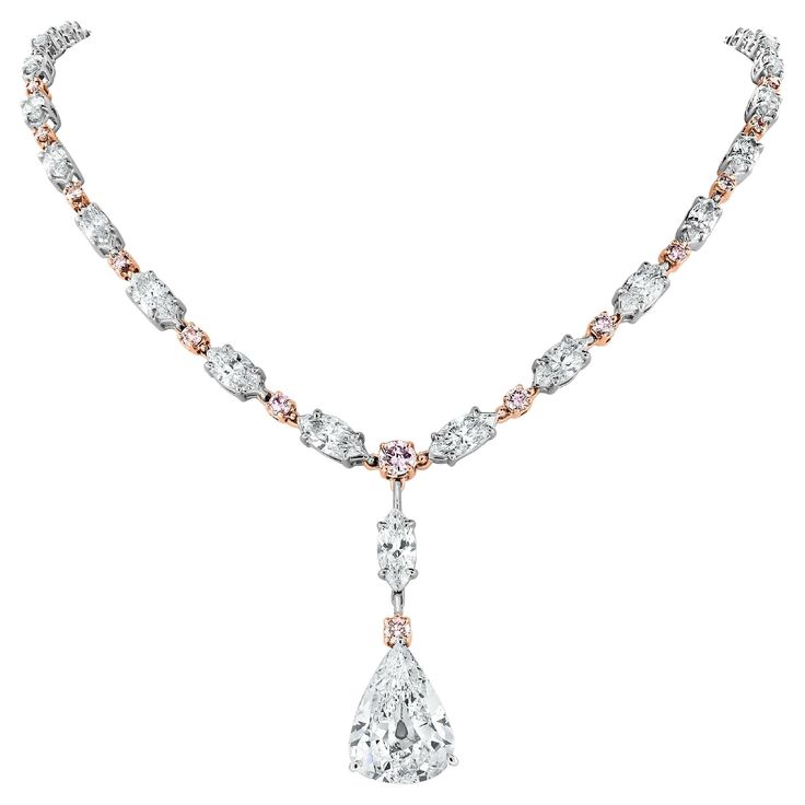 A sensual and dazzling combinations of natural intense pink diamonds with white marquise and pear shapes enables this stunning necklace to create all the drama in its simplicity. The over sized 6.05 ct Pear Shape center takes the neckpiece an extra mile in delivering the oomph effect. Diamonds Shapes: Pear Shape, Marquise & Round Center Solitaire: 6.05 ct Pear Shape G Color VS2 Clarity (IGI 470112965) Total Diamonds Weight: 17.76 ct Diamonds Color: F - G, Fancy - Intense Pink Diamonds Clarity: V Huge Diamond Necklace, Bedroom Ideas Lights, Harry Winston Diamond Necklace, Diamonds Shapes, Harry Winston Diamond, Pear Shapes, Lamps Ideas, Fine Necklace, Dope Jewelry Accessories