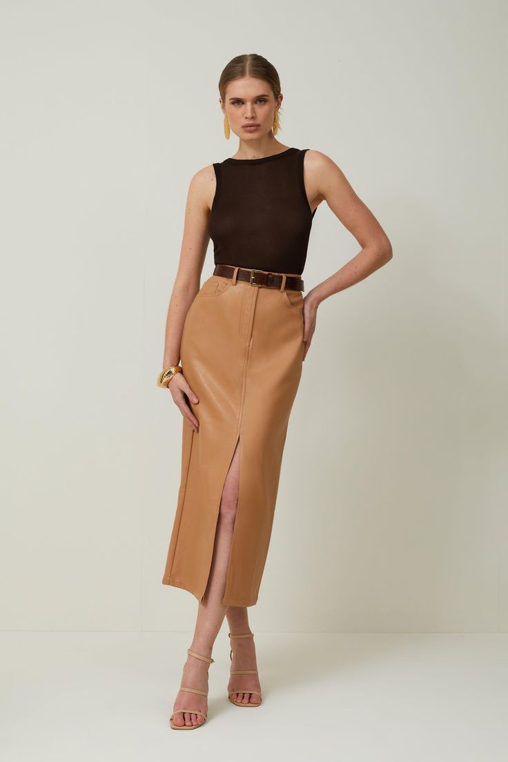 Allow This Closet Staple To Provide An Instant Update To Everyday Rotations. Crafted With Premium Leather, This Midi Skirt Emsuspenders An Off-Duty Aesthetic, While Corset-Style Seaming Adds Dimension To The Piece. Belt Loops And Lapels Add Understated Detailing This Piece. Style This Skirt With Heels And A Crop Top To Exude Understated Elegance At Your Next Event.Midi Hemlineleatherfront Leg Slitzip Fastening Pencil Skirt Heeled Boots, Bodycon Skirt Midi, Mid Length Skirt Classy, Fall Pencil Skirts, Leather Pencil Skirt Midi, Pencil Skirt Leather Jacket, Long Pencil Skirt Shoes, Midi Skirts Work, Camel Leather Pencil Skirt