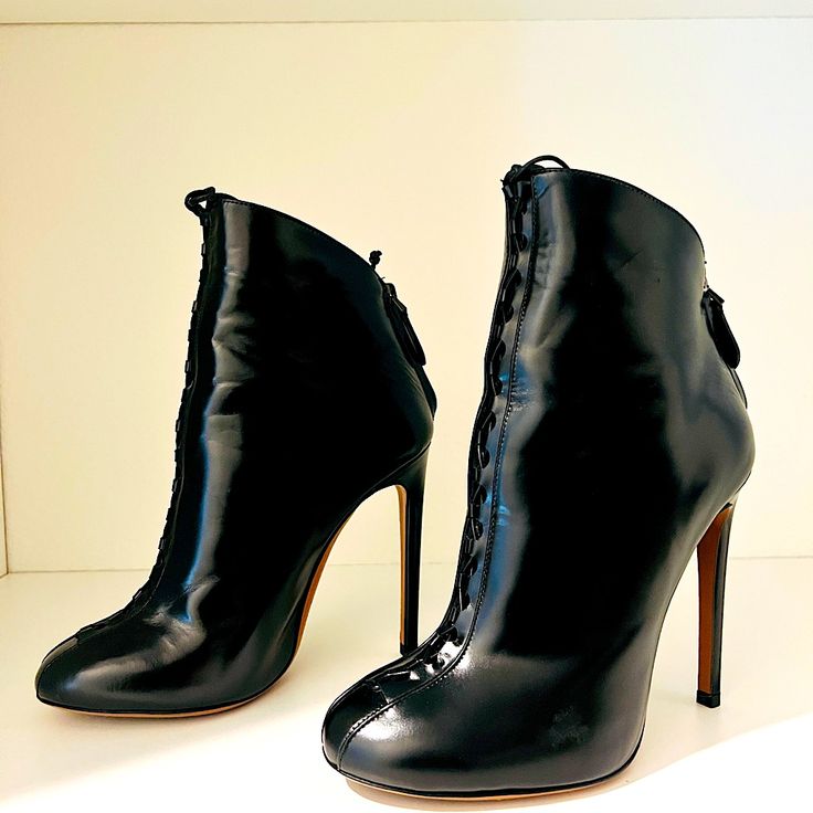 Black Leather Alaa Round-Toe Ankle Boots With Tonal Stitching, Covered Heels, Lace-Up Straps At Uppers And Zip Closures At Counters. Onky Worn Twice! Excellent Condition! Includes Original Box. Alaia Shoes, Shoes Black, Bootie Boots, Original Box, Ankle Boots, Black Leather, Stitching, Size 7, Lace Up