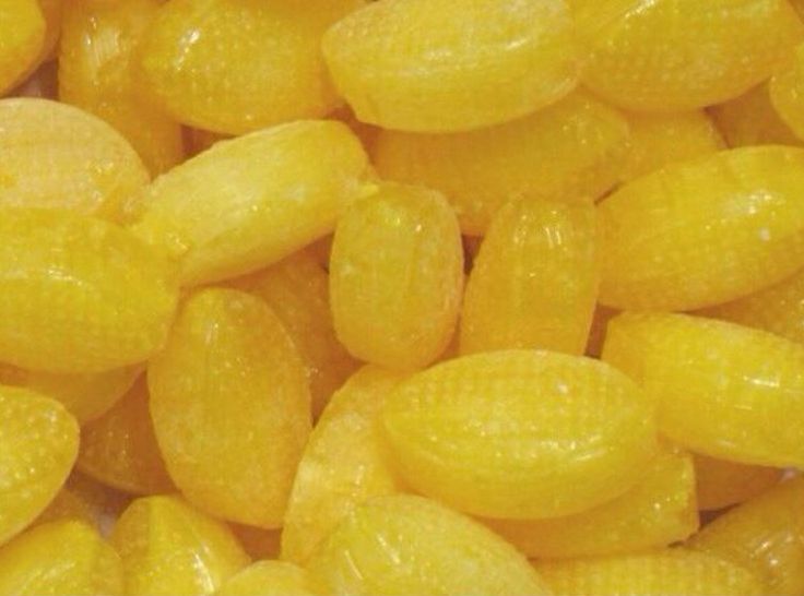 close up view of peeled yellow peanuts