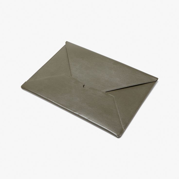 This item is part of a bundle! Buy our complete selection of small leather goods and save 15% using code GETTHEGOODS.Made from luxurious Italian leather, this chic envelope will keep your resume looking polished and professional—just like you. Dimensions: 8 ¾” x 12”. Formal Envelope Clutch, Elegant Envelope Clutch With Card Slots, Chic Business Envelope Clutch, Chic Envelope Clutch For Business, Classic Everyday Envelope Clutch, Classic Envelope Clutch For Everyday Use, Modern Envelope Clutch For Office, Everyday Envelope Clutch, Leather Envelope Clutch For Office