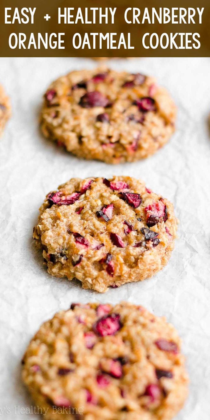 healthy cranberry orange oatmeal cookies on parchment paper with text overlay