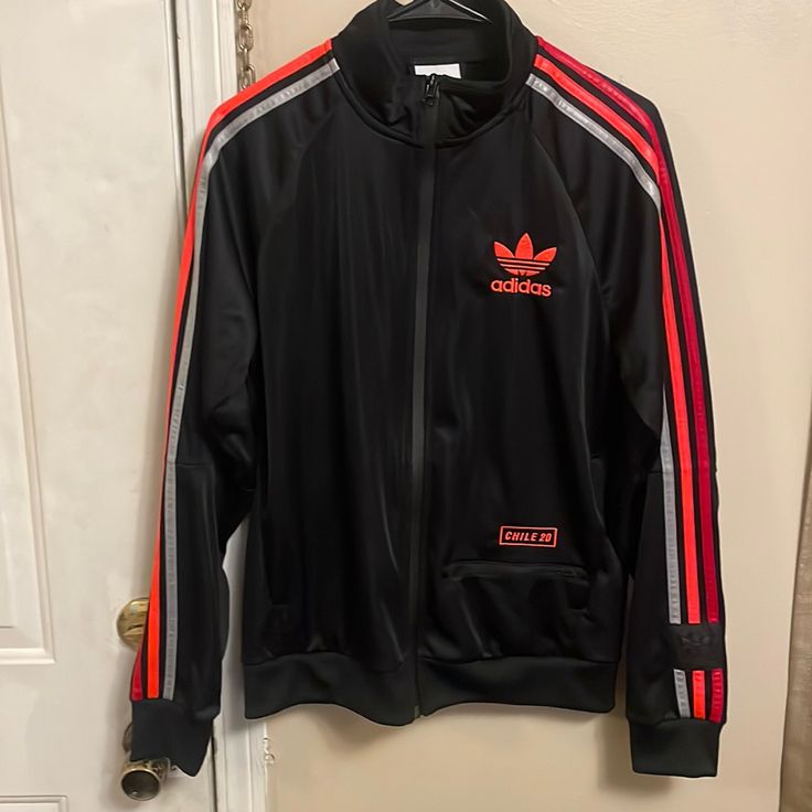 Brand New , Bought As Gift An Wasn’t There Style. Adidas Urban Long Sleeve Track Jacket, Sporty Orange Track Jacket For Streetwear, Orange Sporty Track Jacket For Streetwear, Orange Track Jacket For Fall Streetwear, Orange Casual Track Jacket For Streetwear, Sporty Orange Outerwear For Streetwear, Casual Orange Track Jacket For Winter, Casual Orange Winter Track Jacket, Fitted Black Urban Track Jacket