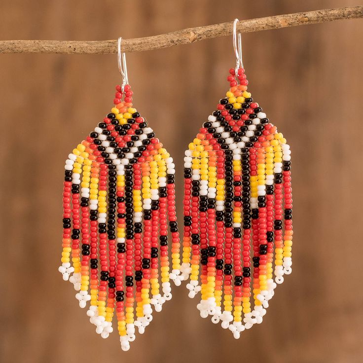 Mirian Zet takes inspiration from her heritage to create a pair of waterfall earrings in honor of Guatemala's culture. Featuring a glass beaded design in a palette of red and orange hues, the accessory comes with a geometric pattern and sterling silver hooks that allow an easy fit. Native American Beadwork Earrings, Brick Stitch Pattern Earring, Waterfall Earrings, Traditional Textiles, Loom Designs, Seed Bead Jewelry Patterns, Bead Loom Designs, Beaded Earrings Native, Earrings Patterns