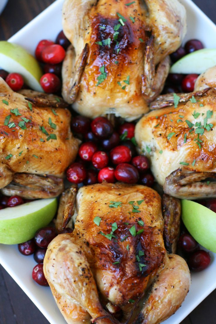 roasted turkey with apples and cranberries on a platter