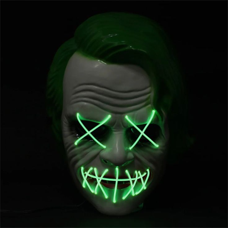 Light up green EL wire Joker mask AA Batteries not included. Batteries can be replaced All EL Wire masks feature a battery pack cord coming from one location on the mask Elastic strap holds mask to the face. Note: All EL Wire makes a high pitched noise. Material: PVC and EL cold light Power supply: 2 x AA battery ( not included ) Perfect for costume parties, Halloween, cosplay, theme parties and more! Ages 12+. Green Halloween Masquerade Mask And Prosthetics, Green Halloween Masquerade Mask, Green Halloween Cosplay Mask, Joker Mask, Scary Halloween Masks, El Wire, Halloween Festival, Carnival Costumes, Halloween Masks