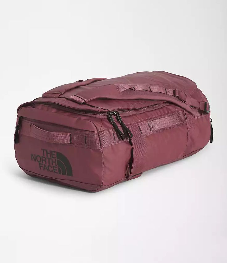 the north face base camp duffel bag in burgundy, front view with zippers